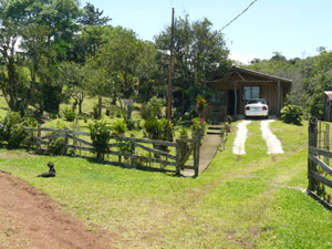 The 2BR 1BA house is beside a secondary road 1.3 kilometers from Tierras Morenas. 