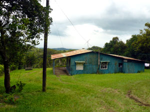 The current farmhouse is a rough structure, but it has electriccal, water, and phone service.