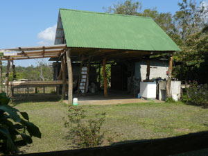 The sheltered bodega, with secure tool house at right.