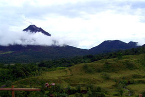 Arenal Volcano and its companion Cerro Chato constant visual stimulation as the clouds and light often play around them and the lava flows from the volcano cascade down the mountainside at night. 