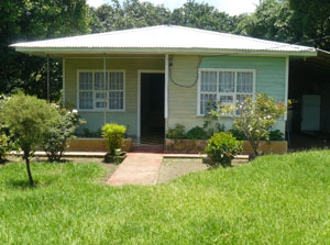 The farmhouse is neatly kept.