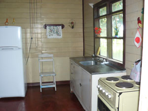 The kitchen is in two rooms. 