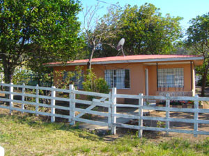 The finca has a 3BR 1BA Tico-style house in good condition.