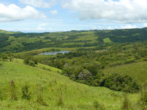 Far below the ridge on the north side is a fine finca with a small lake. 