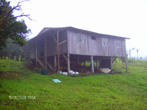 The second house, both of which have water but not electricity.