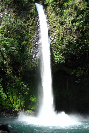 The waterfall, known at the Catarata Fortuna, brings hikers, swimmers, and more adventuresome tourists, who rappel down the waterfall cliffs with tour company guides.