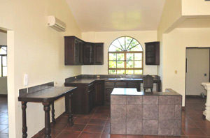 The second floor of the main building has a large owner or manager suite, including this kitchen.