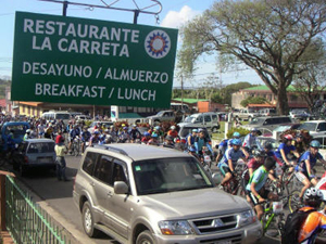 As seen from the outdoor dining room, nearly 4,000 bikers pass by the hotel at the start of the annual 2-day tour of the lake. The town fills up with the bikers and their families and support friends for the huge event.