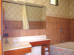 The bathrooms are large and contain tubs as well as showers.