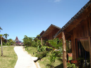 The accomodations include individual cabins facing the volcano.