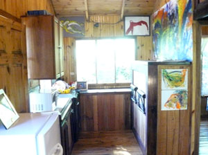 The kitchen has modern appiances and nice native hardwoods.