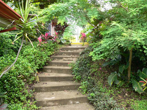 Prettily landscaped paths and curving stairways wind through the grounds.