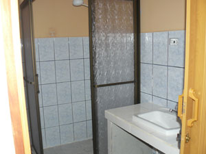 The bathrooms tidy and tiled and have showers.