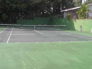 The 20x40 meter tennis court is in fine condition.