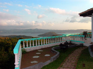 From the south side deck there is a great view of the lake and the beautiful intervening terraiin.