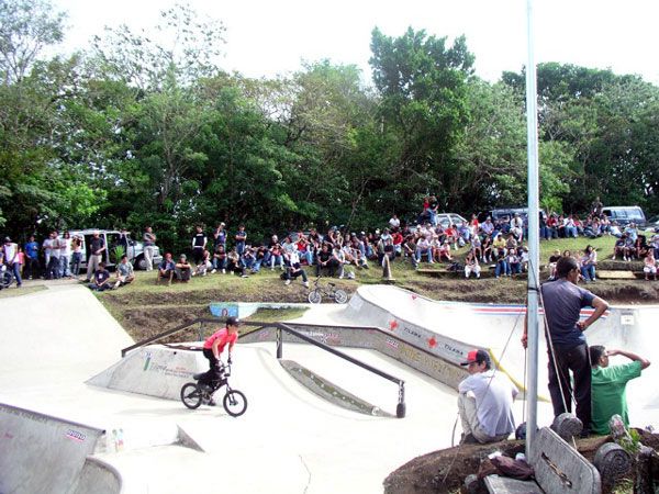 Bikeriding at skateboard park.