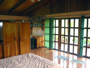 The roomy cabina, with two sleeping areas, a kithen, and a huge bathroom, looks out on the beautiful labyrinth of ponds.