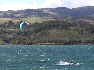 A kite-surfer gets a thrilling ride during the windy season.