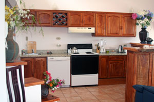 The kitchen's custom cabinetry is extensive and beautiful.