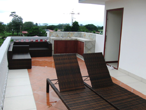 The roof patio and kitchen comprise a relaxing party area of 35 sq meters or 376 sq ft with a fantastic volcano view.