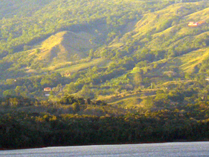 The house is toward the lower left while at upper right is a home in the gated development called La Preserve at Lake Arenal. 