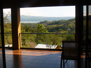 From the open interior as well as the wide veranda there is a beautiful territorial and lake view.