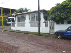 The L-shaped house sits on a corner lot in a neighborhood two minutes from downtown Tilaran.