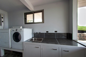 The spacious ground=floor laundry room.