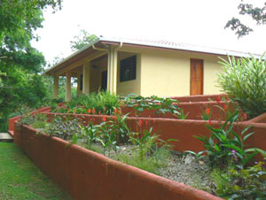 Long terraced concrete flower beds provide unique landscaping.