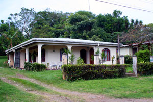 The fairly roomy house has a veranda on two sides to take advantage of the view and the weather. 