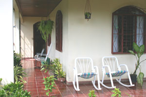 The home has a very pleasant wrap-around veranda. 