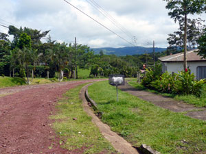 The house is two blocks up a broad residential street from the center of Tronadora village. 