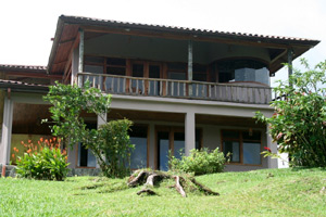 The master suite above and the living room below have perfect lake orientation.