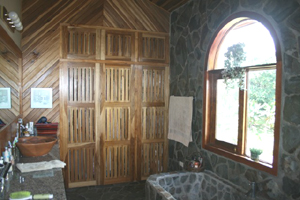 The master bathroom has a laja-faced bathtub.