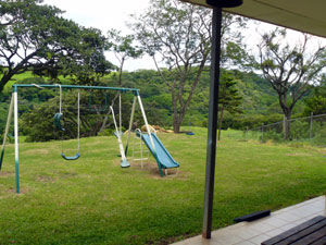 To the southeast is a view of hilly forest and pasture.