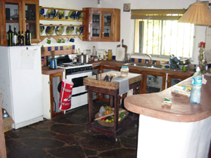 The kitchen has convenient spaces, including small center island.