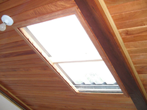 A clear skylight brightens the lounge area. 