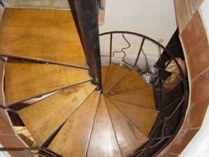 The spiral staircase at second level.