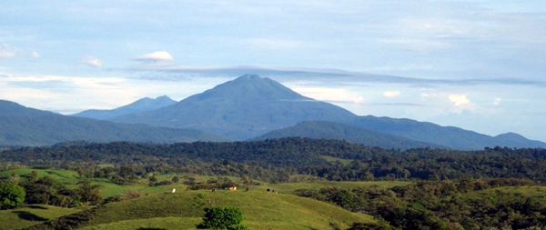 Dormant Tenorio Volcano stands out to the north. 