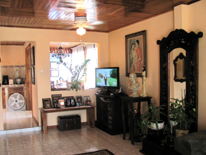 The separate dining room also has a wall opening from the living room.