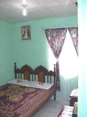 The master bedroom has one of the home's two bathrooms.