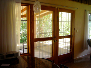 Handsome French doors lad from the family room to the patio.