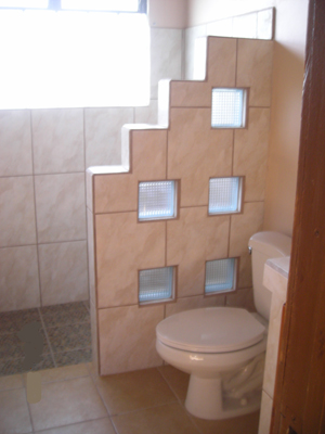 The two modern tiled bathrooms are completely new construction.