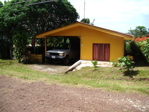 The 3BR 1BA home with carport is on a quiet lane near the center of the village of San Luis.