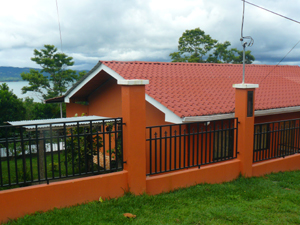 Here, the lake is seen past the house.