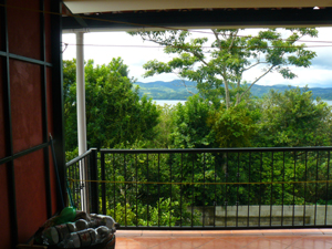 A large covered patio in front of the kitchen is a great place to enjoy the lake views and temperate weather.