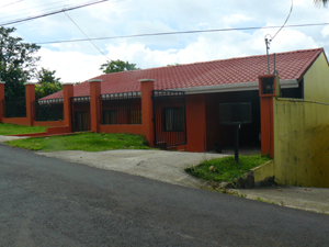 The main floor of the home fronts on the paved Tronadora road as it runs through San Luis.