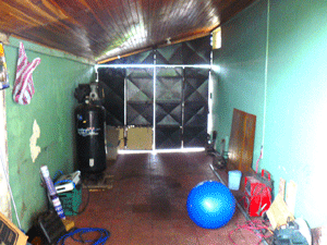 The long single-car garage provides much storage or play space.