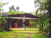 2BR 2BA 4-year-old home in wooded setting at Nuevo Arenal - $115,000.
