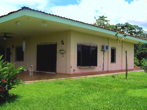 The house not only has very large covered porch but a 4-foot wide walkway all around. 